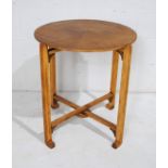 A circular occasional table on folding base - diameter 60cm, height 67cm