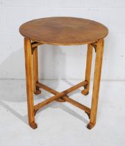 A circular occasional table on folding base - diameter 60cm, height 67cm