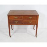 An Edwardian inlaid mahogany chest of four drawers, raised on tapering legs - length 89cm, depth