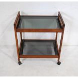 A mid century tea trolley with smoked glass - length 61.5cm, depth 42cm, height 69cm