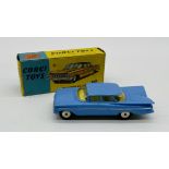 A boxed Corgi Toys Chevrolet "Impala" die-cast car in blue (220)