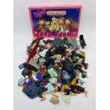 A collection of Bratz dolls accessories including clothing, shoes, boots, skateboard, etc, along