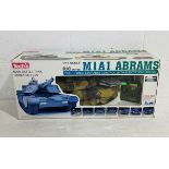 A boxed Tech's remote controlled military M1 A1 Abrams Main Battle Tank with 120MM Cannon