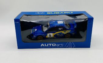 A boxed Auto Art Subaru Impreza WRC 2001 Burns/Reid die-cast rally car (1:18 Scale - 80191)