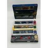 A collection of seven boxed triple pack die-cast military related die-cast vehicles including The