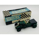 A boxed Scalextric Tri-ang Bentley vintage racing car (C64) - Drivers arm off but present.