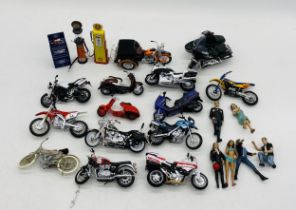 A small collection of unboxed die-cast and plastic motorcycles and bikes, along with two petrol