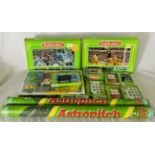 A collection of vintage boxed Subbuteo and accessories including two boxed sets, two tubed astro