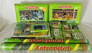 A collection of vintage boxed Subbuteo and accessories including two boxed sets, two tubed astro