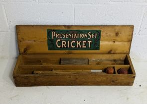 A vintage boxed "The Presentation Set of Cricket" comprising of two sets of wickets and cricket ball