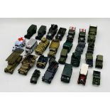 A collection of unboxed military die-cast vehicles including trucks, land rover, ambulances,