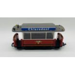 An unboxed Lehmann LGB G gauge model railway "Chlorodont" passenger trolley tram with one passengers