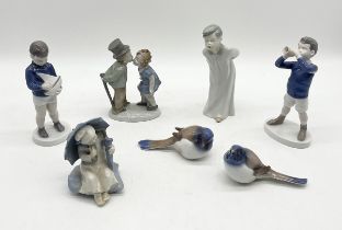 A collection of mainly Bing & Grondahl porcelain figures, birds etc.