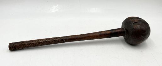 A Fijian "Ula" throwing club with geometric carved grip - length 40cm