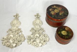 A pair of resin wall sconces in the form of fruit baskets along with two nesting hat boxes with