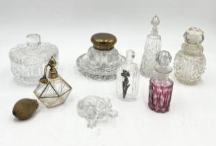 A collection of various cut glass scent bottles including an Art Deco Marcel Franck "Fizz"