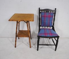 A bamboo occasional table along with a turn of the century ebonised bedroom chair, with carved