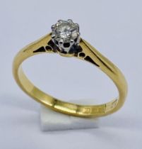 A diamond solitaire ring set in 18ct gold