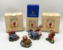 A collection of Winnie the Pooh ornaments from the "Simply Pooh" range etc.