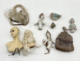 A collection of porcelain half dolls along with a porcelain bust with indistinct signature to back