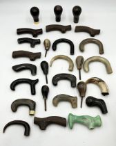 A collection of various walking stick handles etc.