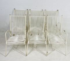 A set of six mid-century Mauser stackable chairs with strung back and seat