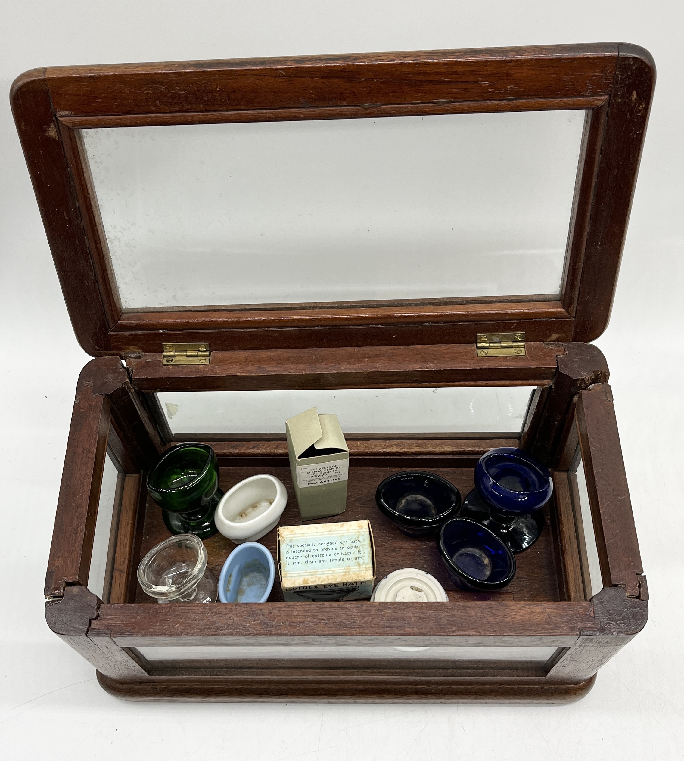 A collection of chemists bottles and bell jars along with a small wooden medical cabinet - Image 4 of 4