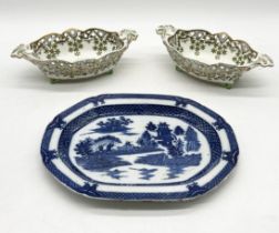 A pair of early 19th century Spode pierced creamware dessert baskets along with a blue and white