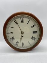 A railway style wall clock, case diameter 37.5cm
