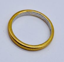 A 22ct gold and platinum wedding band, weight 3.7g