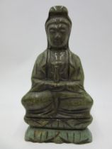 A green hardstone figure of Qing Yin on double lotus throne, height 21cm