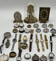 An assortment of clocks, pocket and wrist watches including Looping, Leonidas, Smiths, J G Graves of