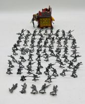 A Britains "Delhi Durbar" elephant figurine, along with a collection of metal soldiers