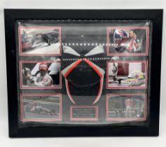 A signed Lewis Hamilton McLaren Mercedes cap framed along with a series of images of his 2008