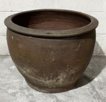 A large salt glazed terracotta planter - height 51cm, diameter 69cm