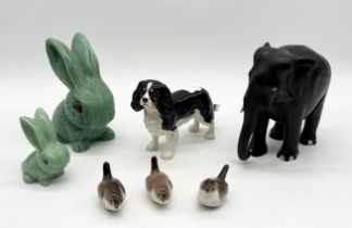 A collection of ceramics etc including Beswick King Charles Spaniel and Sylvac rabbits.