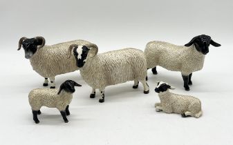 A collection of five Beswick Sheep including two lambs