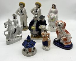 A collection of antique Staffordshire figures and pastel burners including King William, Welsh