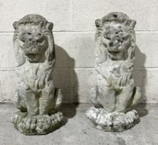 A pair of reconstituted stone garden lions - Height 55cm