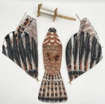 A vintage handmade kite in the form of a bird of prey