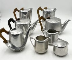 A collection of Picquot Ware including Coffee Pots, Aladdin teapot etc.