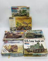 A collection of six boxed military plastic model construction kits including a Nichimo M109 Self-
