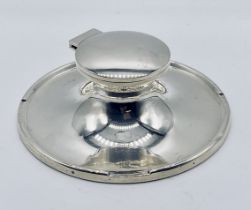 A large hallmarked silver capstan inkwell