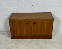 A mid-century two door cabinet with drawer. 100cm x 45cm, height 56cm