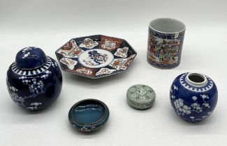 A collection of Oriental china including large Famille Rose cup, ginger jars etc.