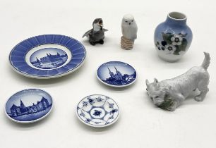 A collection of Royal Copenhagen including owl, terrier, small vase and onion pattern pin dish