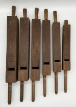 A set of six wooden organ pipes