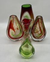 A collection of four art glass vases plus a teardrop sculpture.