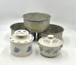 A French ceramic butter crock plus a similar lidded pot along with three galvanised cheese moulds