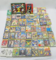 A collection of vintage Spectrum ZX 48/128K computer games including Paperboy, Grand National, Ian